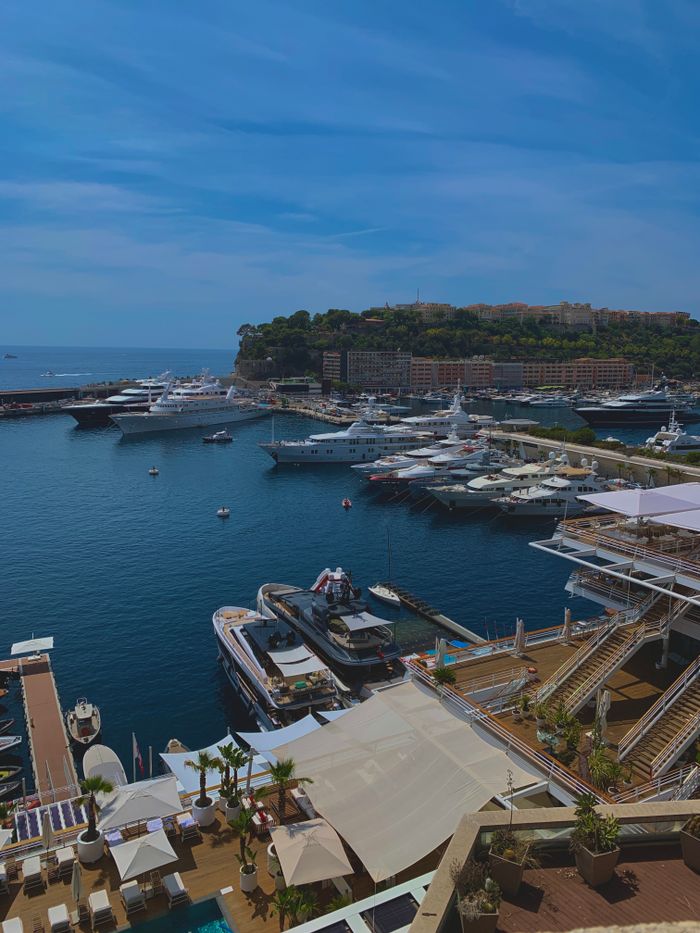 who-we-are Discover the luxurious marina of Monaco with impressive yachts and stunning architecture.